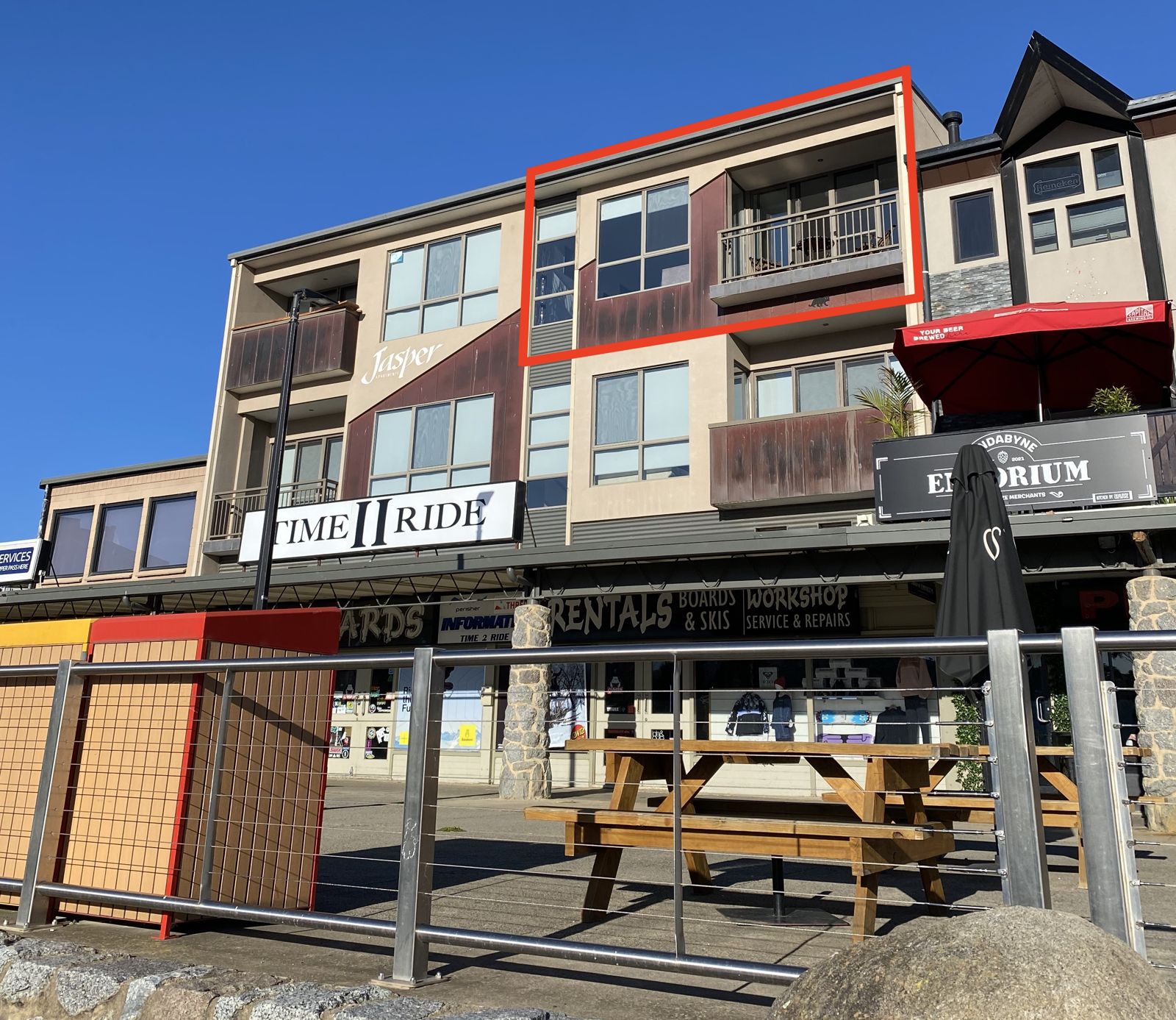 The Jasper building above the shops on Kosciuszko Road, with Jasper 3 outlined in red on the top floor